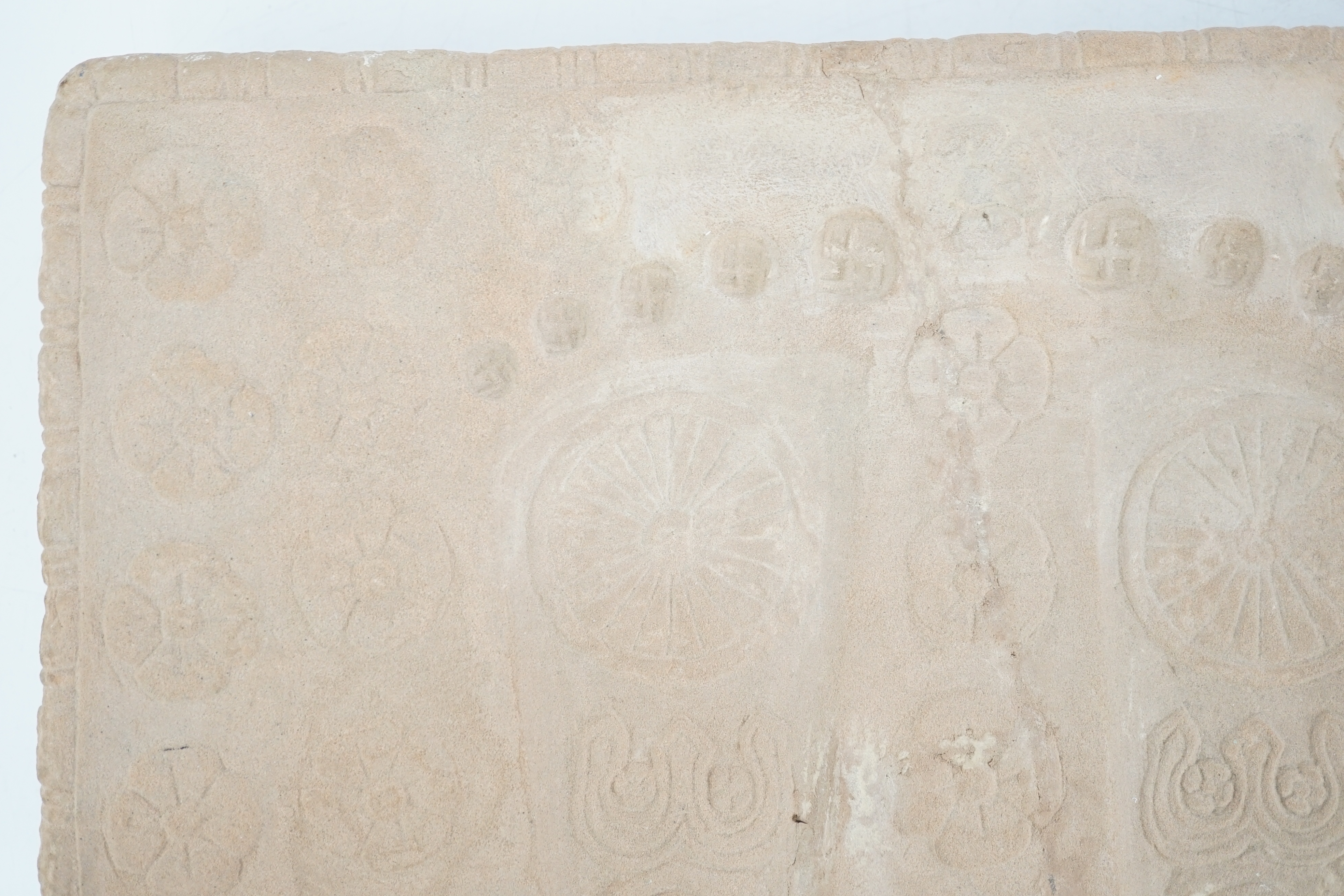 A sandstone relief of Buddha’s foot prints (Buddhapada), Southern India, 12th century